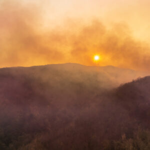 Wildfires release carbon dioxide (CO2) emissions and other greenhouse gases (GHG) that contribute to climate change.
